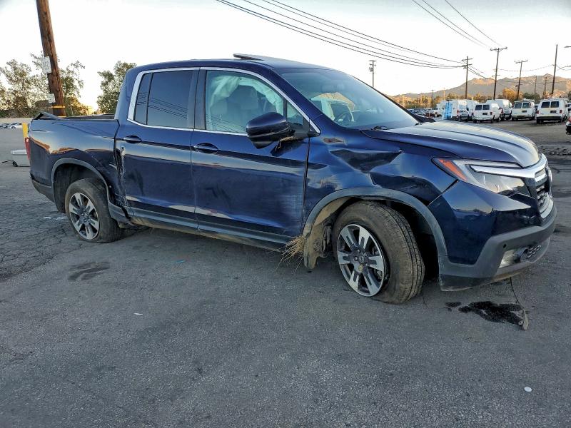 Photo 4 from auction – 2019 HONDA RIDGELINE with VIN 5FPYK3F61KB006752