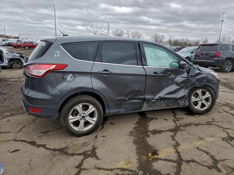 Photo 3 from auction – 2016 FORD ESCAPE SE with VIN 1FMCU0G76GUB84296