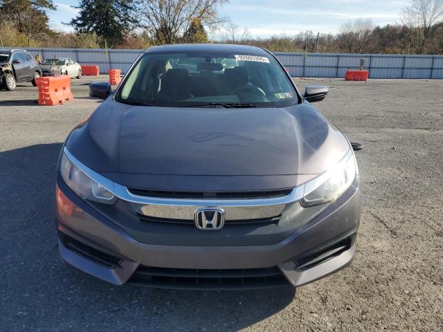 Photo 5 from auction – 2018 HONDA CIVIC EX with VIN 2HGFC2F79JH529625
