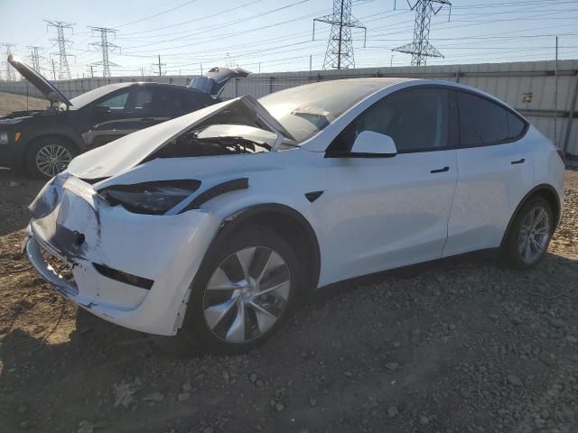 TESLA MODEL Y 2023 with VIN 7SAYGDEE8PF809223 - Photo from auction