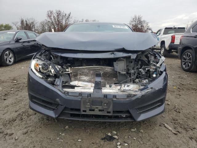 Photo 5 from auction – 2018 HONDA CIVIC LX with VIN 19XFC2F50JE201809