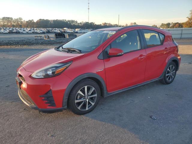 TOYOTA PRIUS C 2018 with VIN JTDKDTB39J1614241 - Photo from auction