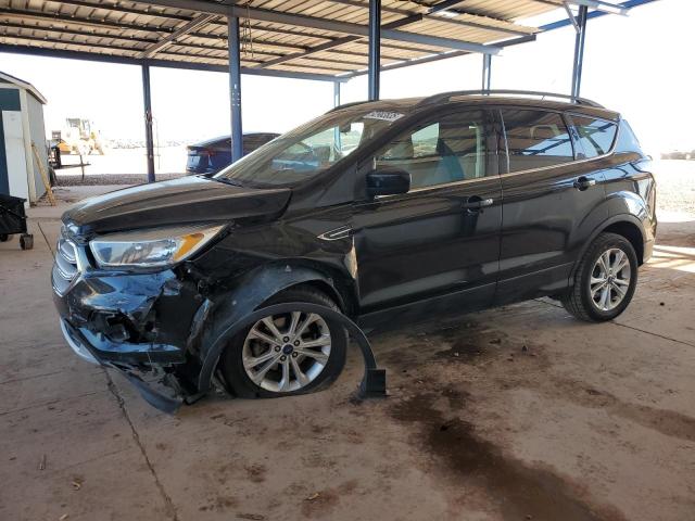 FORD ESCAPE SE 2018 with VIN 1FMCU0GDXJUC08063 - Photo from auction