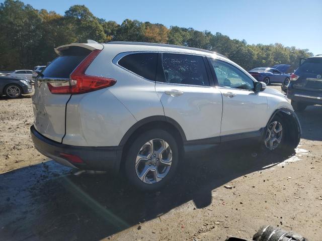 Photo 3 from auction – 2017 HONDA CR-V with VIN 2HKRW1H89HH515678
