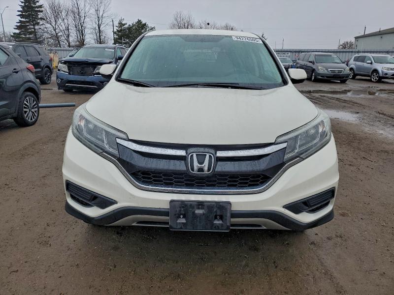 Photo 5 from auction – 2015 HONDA CR-V SE with VIN 2HKRM4H43FH115181