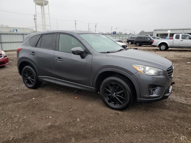 Photo 4 from auction – 2016 MAZDA CX-5 TOURI with VIN JM3KE4CY5G0633047