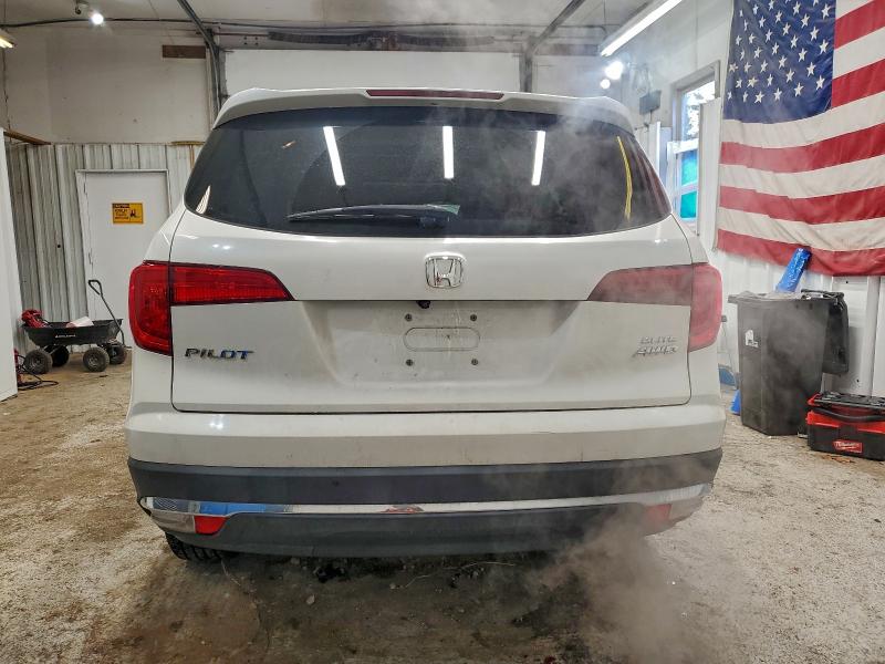 Photo 6 from auction – 2018 HONDA PILOT ELIT with VIN 5FNYF6H01JB030135