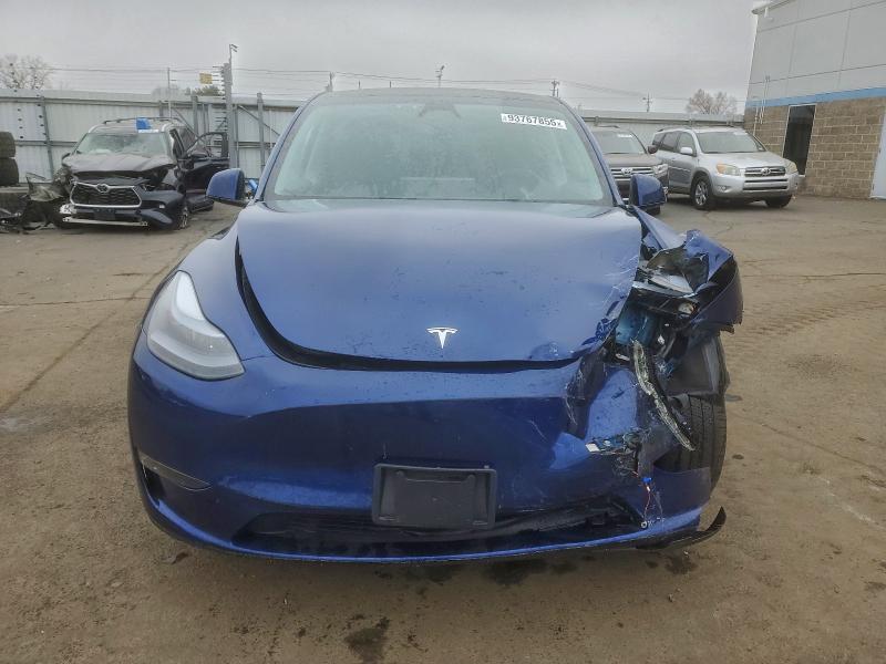 Photo 5 from auction – 2025 TESLA MODEL Y with VIN 7SAYGDEE0SA352574