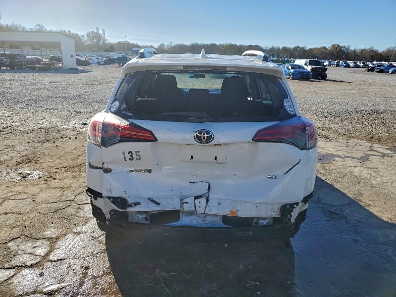Photo 6 from auction – 2016 TOYOTA RAV4 LE with VIN JTMZFREV4GJ084052