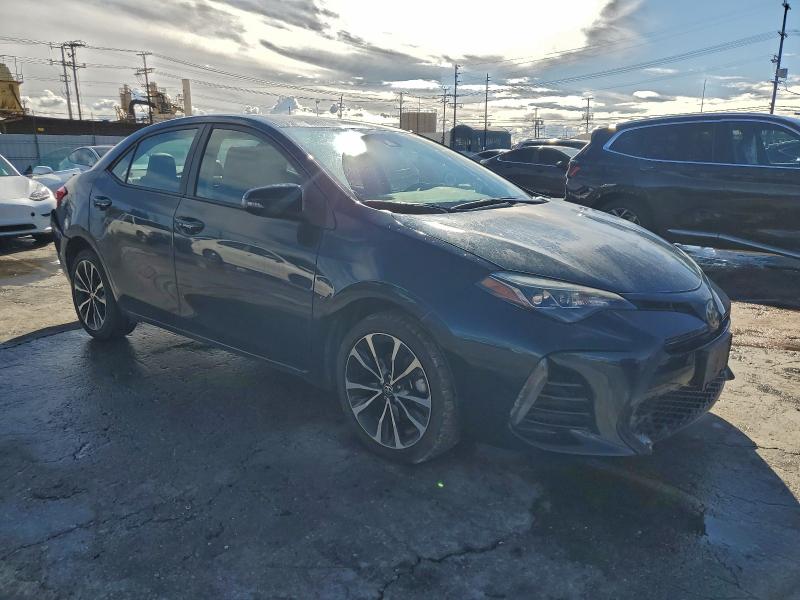 Foto 4 de la subasta – 2017 TOYOTA COROLLA L con VIN 5YFBURHE6HP594564
