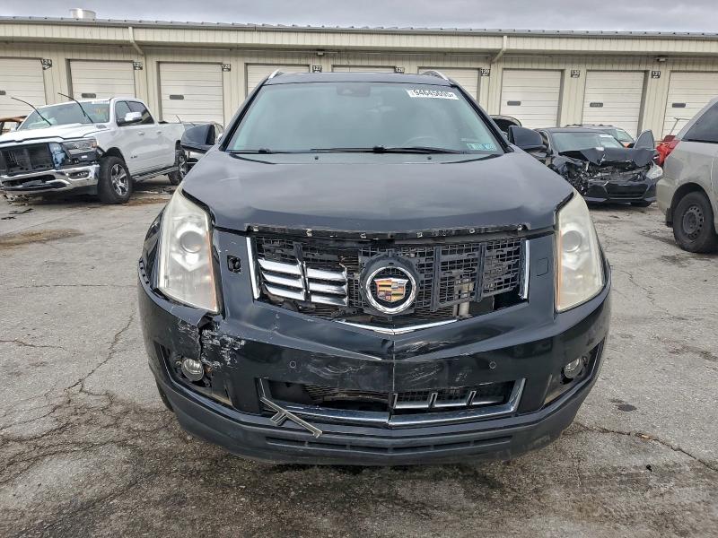 Photo 5 from auction – 2013 CADILLAC SRX PERFOR with VIN 3GYFNDE33DS608660