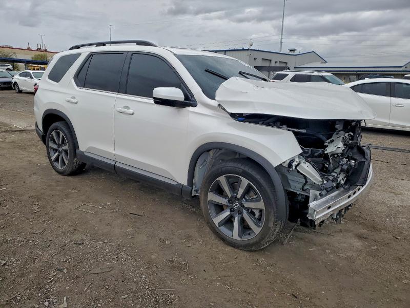Photo 4 from auction – 2025 HONDA PILOT with VIN 5FNYG2H77SB037711