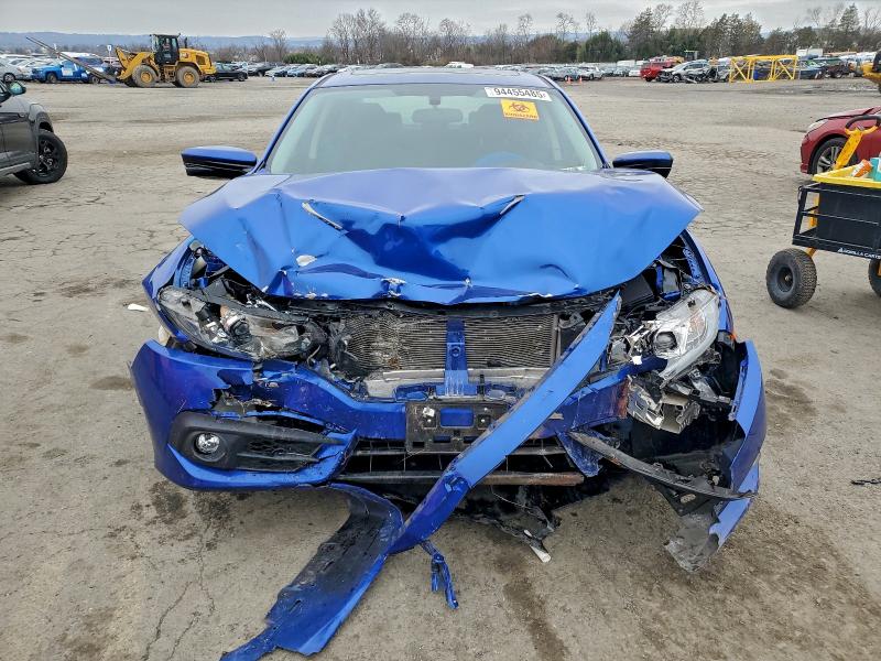 Photo 5 from auction – 2018 HONDA CIVIC EX with VIN JHMFC1F32JX019987