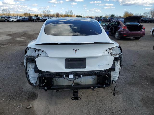 Photo 6 from auction – 2022 TESLA MODEL 3 with VIN 5YJ3E1EBXNF339050