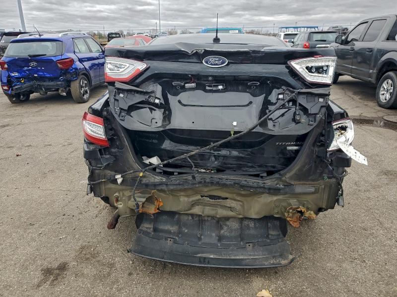 Photo 6 from auction – 2016 FORD FUSION TIT with VIN 3FA6P0D91GR163853