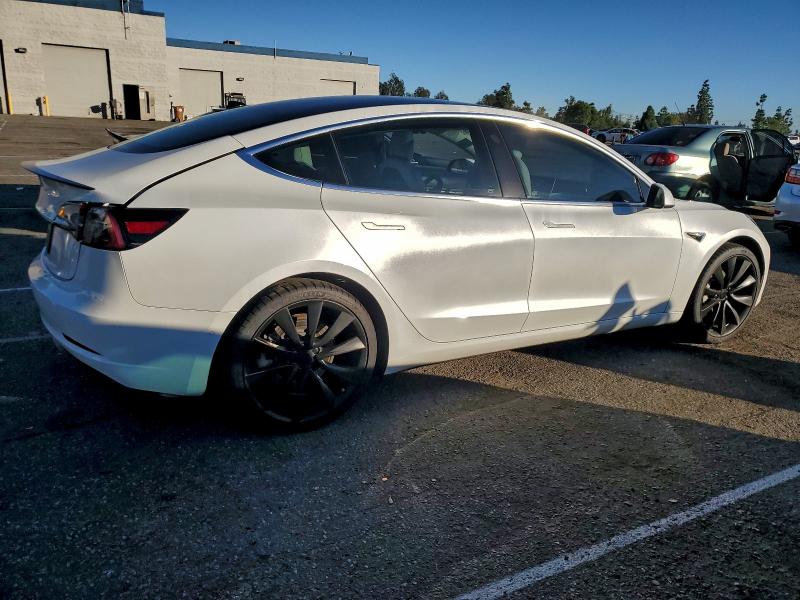 Photo 3 from auction – 2019 TESLA MODEL 3 with VIN 5YJ3E1EA2KF486532