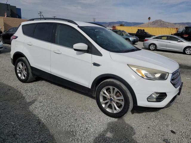Photo 4 from auction – 2018 FORD ESCAPE SE with VIN 1FMCU0GD5JUA25539