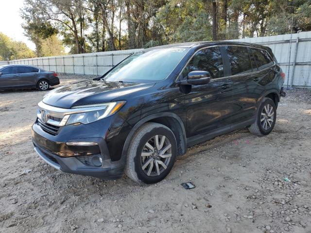 HONDA PILOT EXL 2021 with VIN 5FNYF5H55MB009931 - Photo from auction