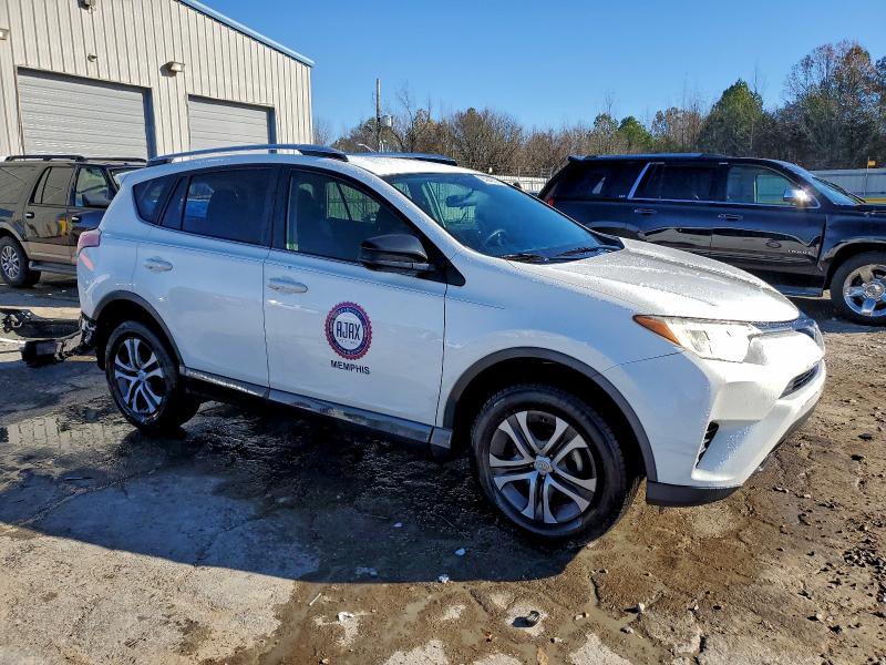 Photo 4 from auction – 2016 TOYOTA RAV4 LE with VIN JTMZFREV4GJ084052