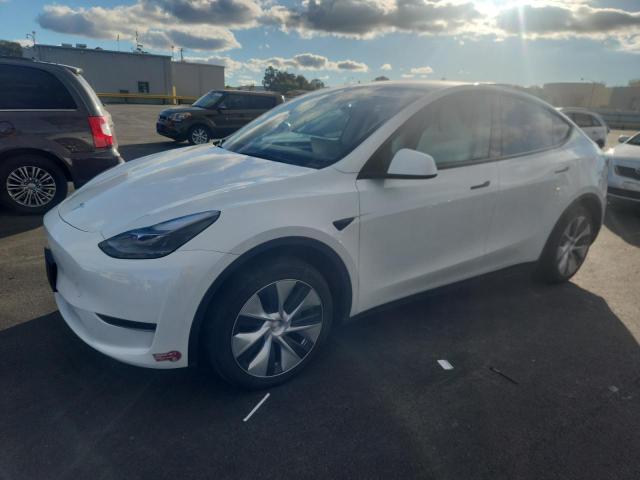 TESLA MODEL Y 2024 с VIN 7SAYGDED6RF010602 - Снимка от търг