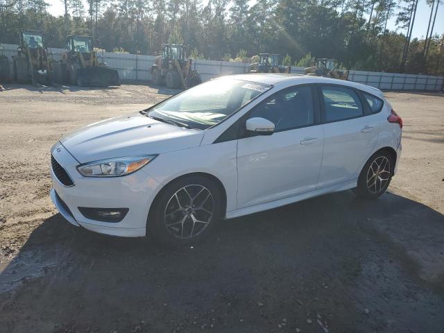 FORD FOCUS SE 2015 with VIN 1FADP3K21FL214456 - Photo from auction