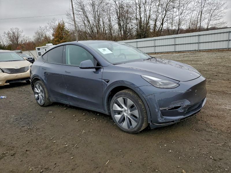 Photo 4 from auction – 2023 TESLA MODEL Y with VIN 7SAYGDED4PF933948