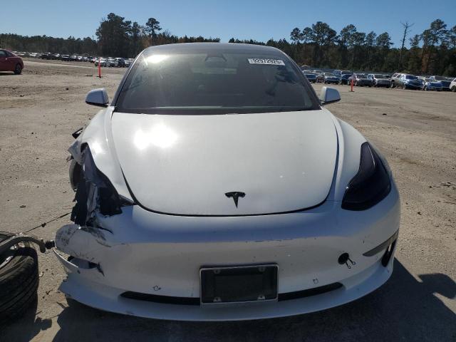 Photo 5 from auction – 2022 TESLA MODEL 3 with VIN 5YJ3E1EB9NF104641