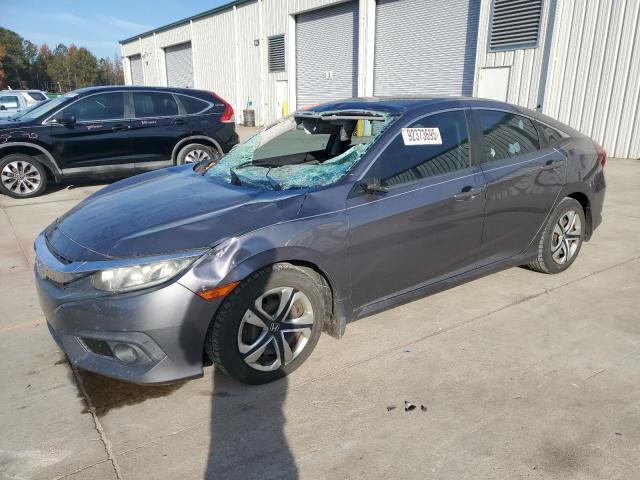 HONDA CIVIC LX 2016 with VIN 19XFC2F62GE056399 - Photo from auction