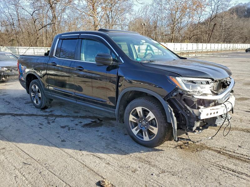 Photo 4 from auction – 2019 HONDA RIDGELINE with VIN 5FPYK3F66KB025832