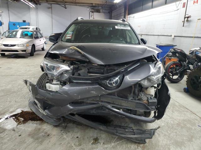 Photo 5 from auction – 2018 TOYOTA RAV4 LE with VIN JTMBFREV8JJ746899