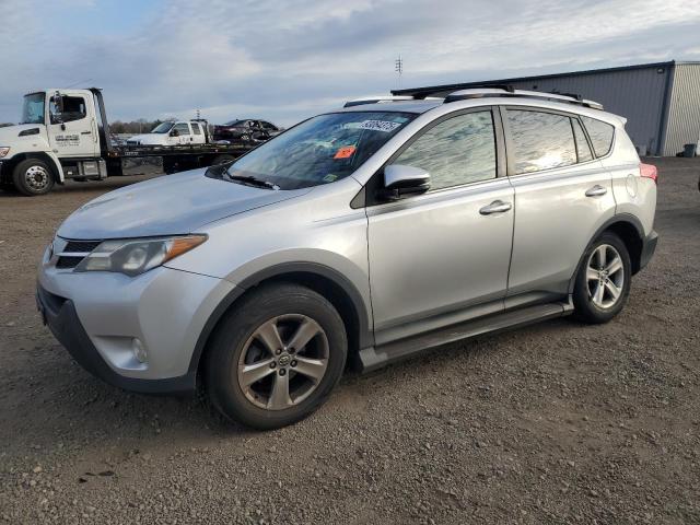 TOYOTA RAV4 XLE 2015 with VIN JTMRFREV4FJ050529 - Photo from auction