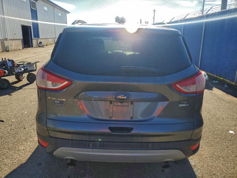 Photo 6 from auction – 2016 FORD ESCAPE SE with VIN 1FMCU9GX2GUA33749