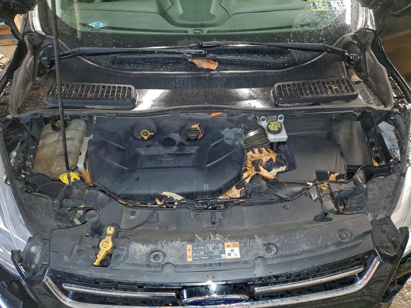 Photo 12 from auction – 2015 FORD ESCAPE TIT with VIN 1FMCU9J95FUA28909