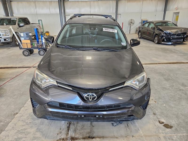 Photo 5 from auction – 2017 TOYOTA RAV4 LE with VIN JTMBFREV4HJ151218