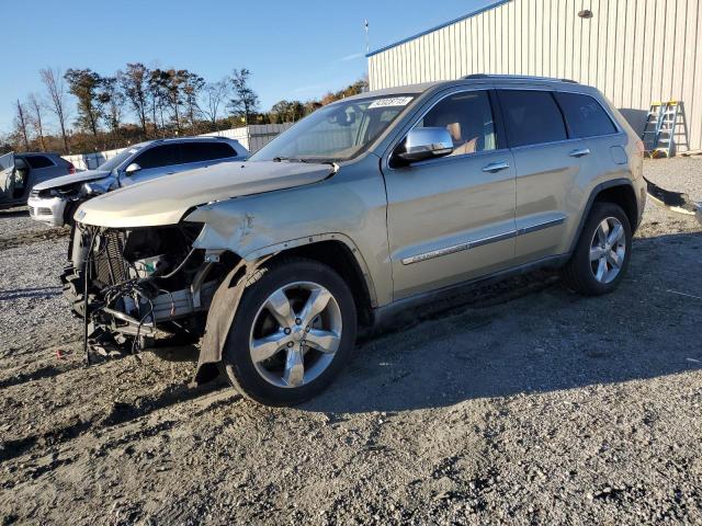JEEP GRAND CHER 2011 with VIN 1J4RS6GT5BC710639 - Photo from auction