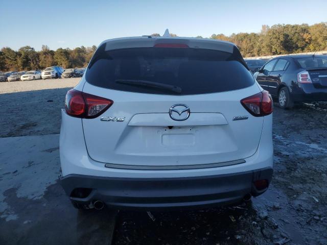 Photo 6 from auction – 2014 MAZDA CX-5 SPORT with VIN JM3KE2BEXE0382258
