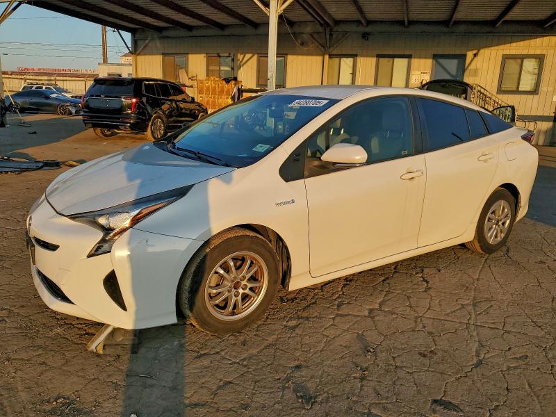 Photo 1 from auction – 2016 TOYOTA PRIUS with VIN JTDKBRFU4G3018429
