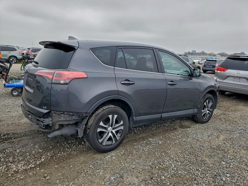 Photo 3 from auction – 2018 TOYOTA RAV4 LE with VIN 2T3ZFREV7JW496121