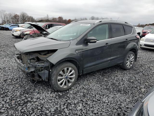 FORD ESCAPE TIT 2017 with VIN 1FMCU9JD2HUD63648 - Photo from auction