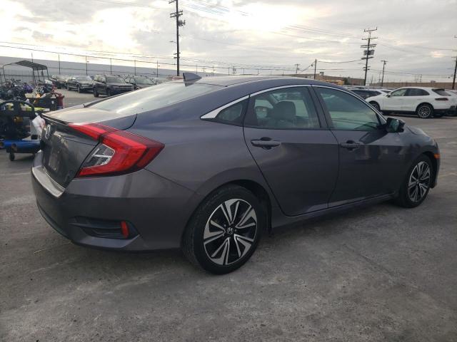 Photo 3 from auction – 2017 HONDA CIVIC EX with VIN 2HGFC1F32HH655536