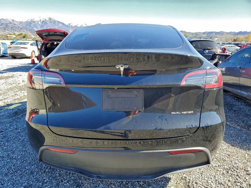 Photo 6 from auction – 2023 TESLA MODEL Y with VIN 7SAYGAEE7PF621825