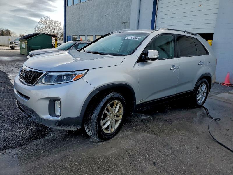 KIA SORENTO LX 2015 with VIN 5XYKTCA69FG630199 - Photo from auction