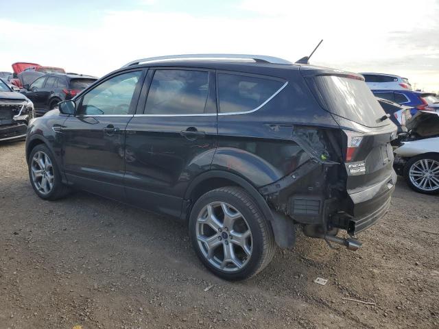 Photo 2 from auction – 2018 FORD ESCAPE TIT with VIN 1FMCU9J95JUA38929