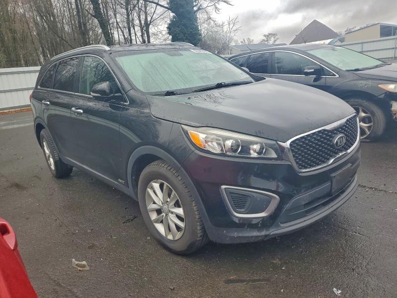 Photo 4 from auction – 2016 KIA SORENTO LX with VIN 5XYPGDA31GG022930