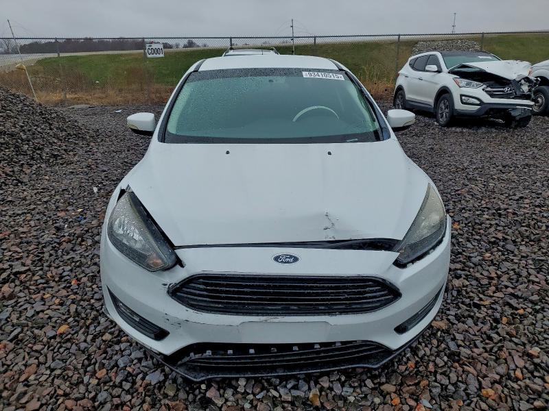 Foto 5 de la subasta – 2018 FORD FOCUS SE con VIN 1FADP3FE8JL301462