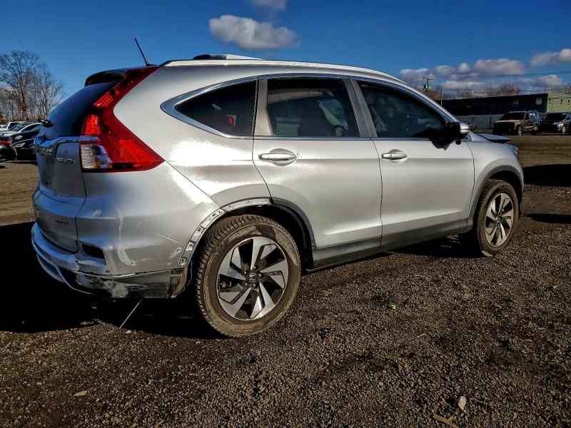 Photo 3 from auction – 2016 HONDA CR-V TOURI with VIN 5J6RM4H96GL049941