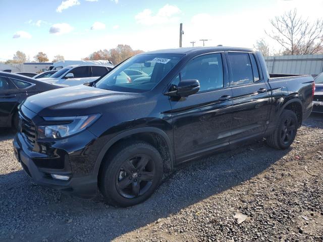 HONDA RIDGELINE 2023 with VIN 5FPYK3F8XPB055814 - Photo from auction