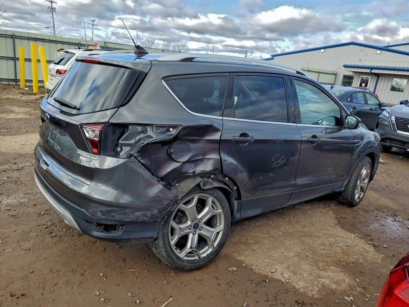 Photo 3 from auction – 2019 FORD ESCAPE TIT with VIN 1FMCU9J98KUC10372
