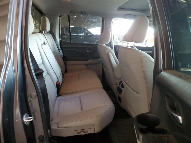 Photo 10 from auction – 2023 HONDA RIDGELINE with VIN 5FPYK3F77PB041229