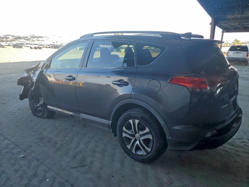 Photo 2 from auction – 2017 TOYOTA RAV4 LE with VIN 2T3BFREV3HW572221